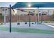 Enjoy outdoor fun on the swings, part of the community's playground area at 7122 Red Gulch St, North Las Vegas, NV 89084