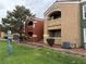 Exterior view of multi-Gathering dwelling with grass and common area at 8101 W Flamingo Rd # 1102, Las Vegas, NV 89147