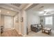 Comfortable living room with hardwood floors, neutral paint, and a cozy couch, ready for relaxation at 8257 Skye Peak St, Las Vegas, NV 89166