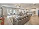Open-concept living space seamlessly connects to a stylish kitchen, perfect for modern living and entertaining guests at 8257 Skye Peak St, Las Vegas, NV 89166