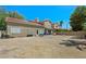 Backyard shot showing patio, seating, and exterior of the house at 8355 Cabin Peak St, Las Vegas, NV 89123