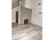 Cozy living room featuring a modern fireplace, new floors, and ample space at 8355 Cabin Peak St, Las Vegas, NV 89123