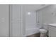 Bright bathroom with white storage cabinet and combined shower and tub at 8410 Eldora Ave # 1045, Las Vegas, NV 89117