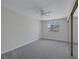 Bedroom featuring plush carpet, neutral walls, natural light, and a mirrored closet at 8410 Eldora Ave # 1045, Las Vegas, NV 89117