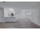 Open floor plan features modern kitchen with new countertops, cabinets, and stainless appliances at 8410 Eldora Ave # 1045, Las Vegas, NV 89117