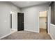 Well-lit bedroom features modern doors, closet and neutral carpeting at 8647 Tortoise Canyon Ct, Las Vegas, NV 89148
