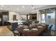 Open floor plan showcasing the dining area connected to the modern kitchen and cozy living room at 8647 Tortoise Canyon Ct, Las Vegas, NV 89148