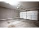Spacious garage with white door at 8647 Tortoise Canyon Ct, Las Vegas, NV 89148