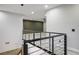 Hallway with modern railings and accent wall provides a bright and open feel at 8647 Tortoise Canyon Ct, Las Vegas, NV 89148