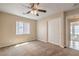 Bedroom featuring large windows allowing bright natural light and a ceiling fan with light fixture at 8664 Frasure Falls Ave, Las Vegas, NV 89178