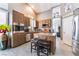 Modern kitchen featuring stainless steel appliances, updated countertops and hardwood cabinetry at 8911 Lansberry Ct, Las Vegas, NV 89147