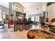Stylish living room featuring an entertainment bar, hardwood floors and a relaxing seating area at 8911 Lansberry Ct, Las Vegas, NV 89147
