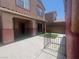 Spacious backyard with ample patio space and artificial turf at 8990 Partridge Hill St, Las Vegas, NV 89148