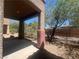 Backyard patio area featuring a covered patio and view of the yard at 8990 Partridge Hill St, Las Vegas, NV 89148