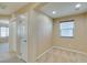 Neutral hallway with carpet and multiple doorways at 9019 Winchester Ridge St, Las Vegas, NV 89139