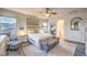 Serene bedroom with a bench, nightstands, and views to a study room at 9805 Turtle Walk Ave, Las Vegas, NV 89149