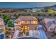 Charming two-story home boasts a three-car garage, desert landscaping and close proximity to neighborhood school at 9805 Turtle Walk Ave, Las Vegas, NV 89149