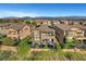 An aerial view showcases a backyard with a pool, hot tub, and outdoor seating in a suburban neighborhood at , Las Vegas, NV 89138
