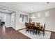 Formal dining room with wood floors, plantation shutters, stylish lighting and seating for six at , Las Vegas, NV 89138