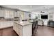Open kitchen featuring large island with seating and views of the living area at , Las Vegas, NV 89138