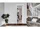 A relaxed and inviting living space flows into a bedroom beyond the doorway at , Las Vegas, NV 89138