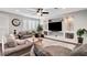 Comfortable living room featuring a large TV, built-in shelving, and stylish decor at , Las Vegas, NV 89138