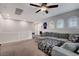 Cozy loft with comfortable seating, ceiling fan, and arched windows providing ample natural light at , Las Vegas, NV 89138