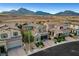 Charming two-story stucco home with a two-car garage, brick driveway and mountain views at , Las Vegas, NV 89138