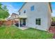 Lush backyard with a well-maintained lawn, covered patio, and privacy fence, ideal for outdoor enjoyment at 10426 Mount Washington Ave, Las Vegas, NV 89166