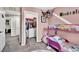 Another view of bedroom with walk-in closet and themed decor at 10426 Mount Washington Ave, Las Vegas, NV 89166