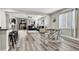 Bright open-concept living area seamlessly connecting the kitchen, dining space, and living room at 10426 Mount Washington Ave, Las Vegas, NV 89166