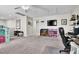 Spacious living room featuring neutral paint, storage for shoes and a playhouse at 10426 Mount Washington Ave, Las Vegas, NV 89166
