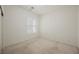 Neutral bedroom with shuttered window for natural light and carpet flooring at 1100 Cypress Ridge Ln, Las Vegas, NV 89144