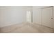 Bedroom with sliding closet doors and neutral carpeting for a cozy feel at 1100 Cypress Ridge Ln, Las Vegas, NV 89144