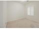 Bright bedroom with neutral carpet, white walls and trim, and a window with white shutters at 1100 Cypress Ridge Ln, Las Vegas, NV 89144