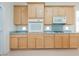 Close up view of the kitchen cabinets and appliances at 1100 Cypress Ridge Ln, Las Vegas, NV 89144
