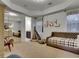 Cozy bedroom featuring two twin beds, a tent, and sliding mirror door closet at 12056 Royal Dolnoch Ct, Las Vegas, NV 89141