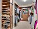 Spacious walk-in closet with custom shelving and ample storage for shoes, clothes, and accessories at 12056 Royal Dolnoch Ct, Las Vegas, NV 89141