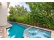 Backyard inground pool and spa with beautiful privacy landscaping at 12056 Royal Dolnoch Ct, Las Vegas, NV 89141