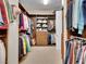 Spacious walk-in closet with custom shelving and ample storage for clothing and accessories at 12056 Royal Dolnoch Ct, Las Vegas, NV 89141