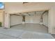 Spacious two-car garage with epoxy flooring, providing ample storage and parking space with great lighting at 1221 Diamond Valley St, Henderson, NV 89052