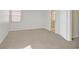 Comfortable bedroom features neutral carpet with attached bathroom at 1221 Diamond Valley St, Henderson, NV 89052