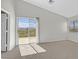 Bright main bedroom with large windows and sliding door to outdoor balcony at 1221 Diamond Valley St, Henderson, NV 89052