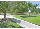 Scenic neighborhood park with lush green spaces, walking paths, and shaded picnic areas at 1221 Diamond Valley St, Henderson, NV 89052