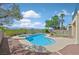 Inviting backyard pool and spa offer a serene oasis with mountain views at 1221 Diamond Valley St, Henderson, NV 89052