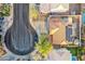 Directly above a home with solar panels, a pool, and well-kept yards nestled in a peaceful neighborhood at 1287 Dove Tree Ct, Henderson, NV 89014