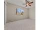 Bedroom with ceiling fan and a bright window view at 1287 Dove Tree Ct, Henderson, NV 89014