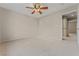 Bedroom with ceiling fan and access to hallway at 1287 Dove Tree Ct, Henderson, NV 89014