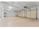 Spacious three-car garage featuring ample room for parking and storage at 1287 Dove Tree Ct, Henderson, NV 89014