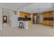 Spacious kitchen with island, stainless appliances, and breakfast bar seating at 1287 Dove Tree Ct, Henderson, NV 89014